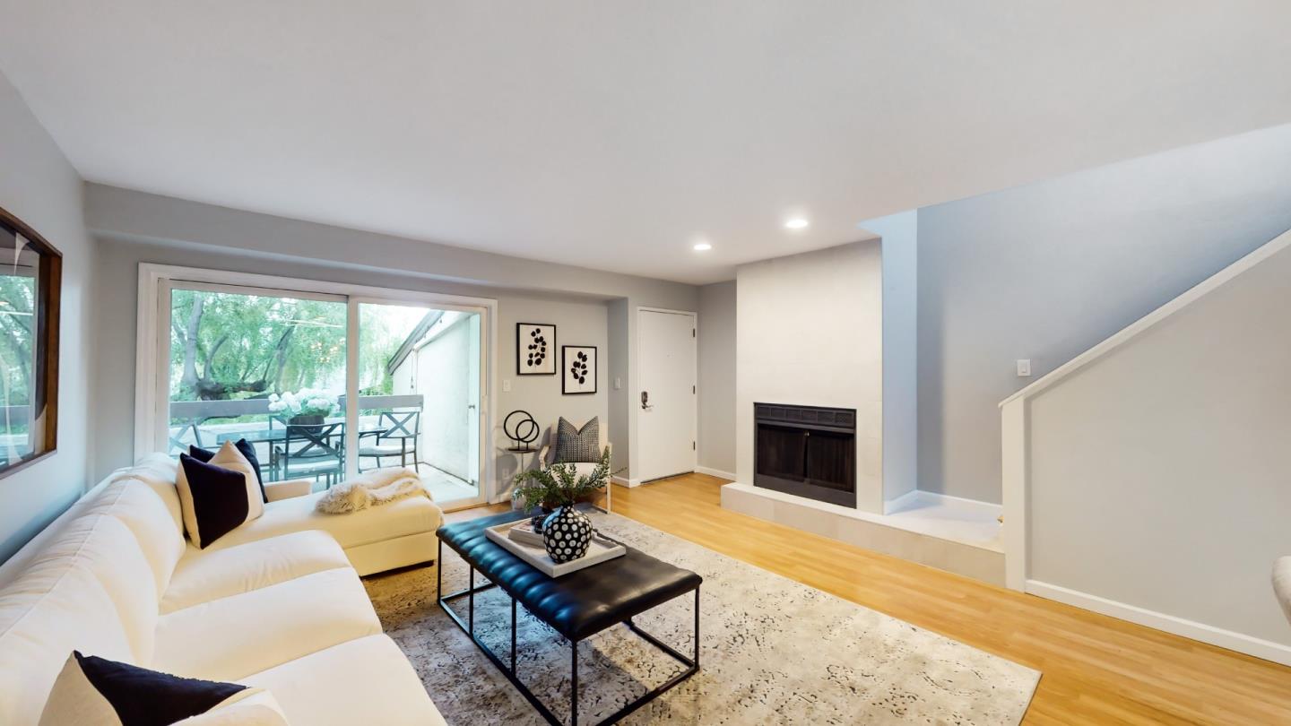 2201 The Alameda, Unit 27 Santa Clara, CA 95050 - Photo 3 of 25 a living room with furniture fireplace and window
