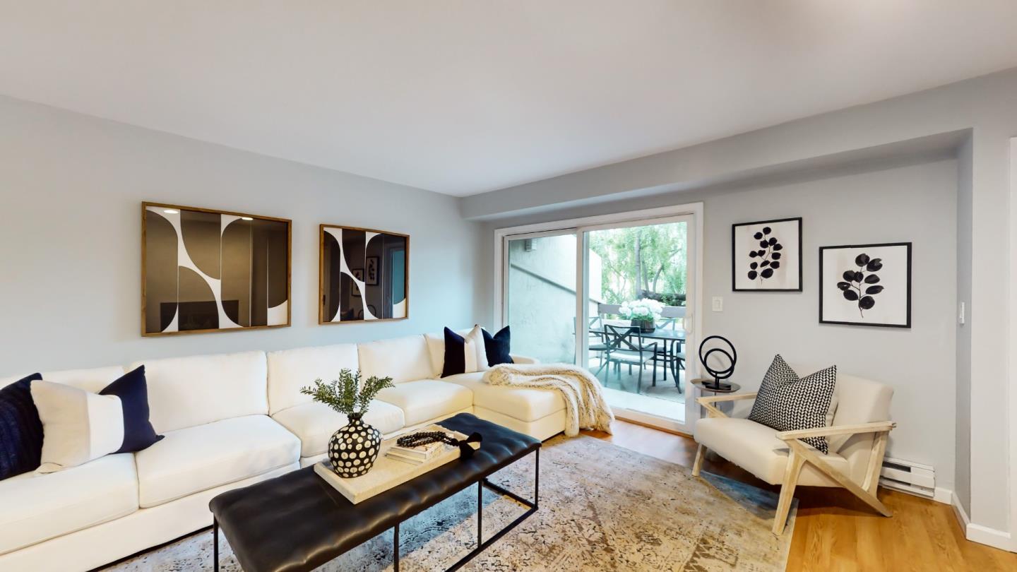 2201 The Alameda, Unit 27 Santa Clara, CA 95050 - Photo 5 of 25 a living room with furniture and a large window