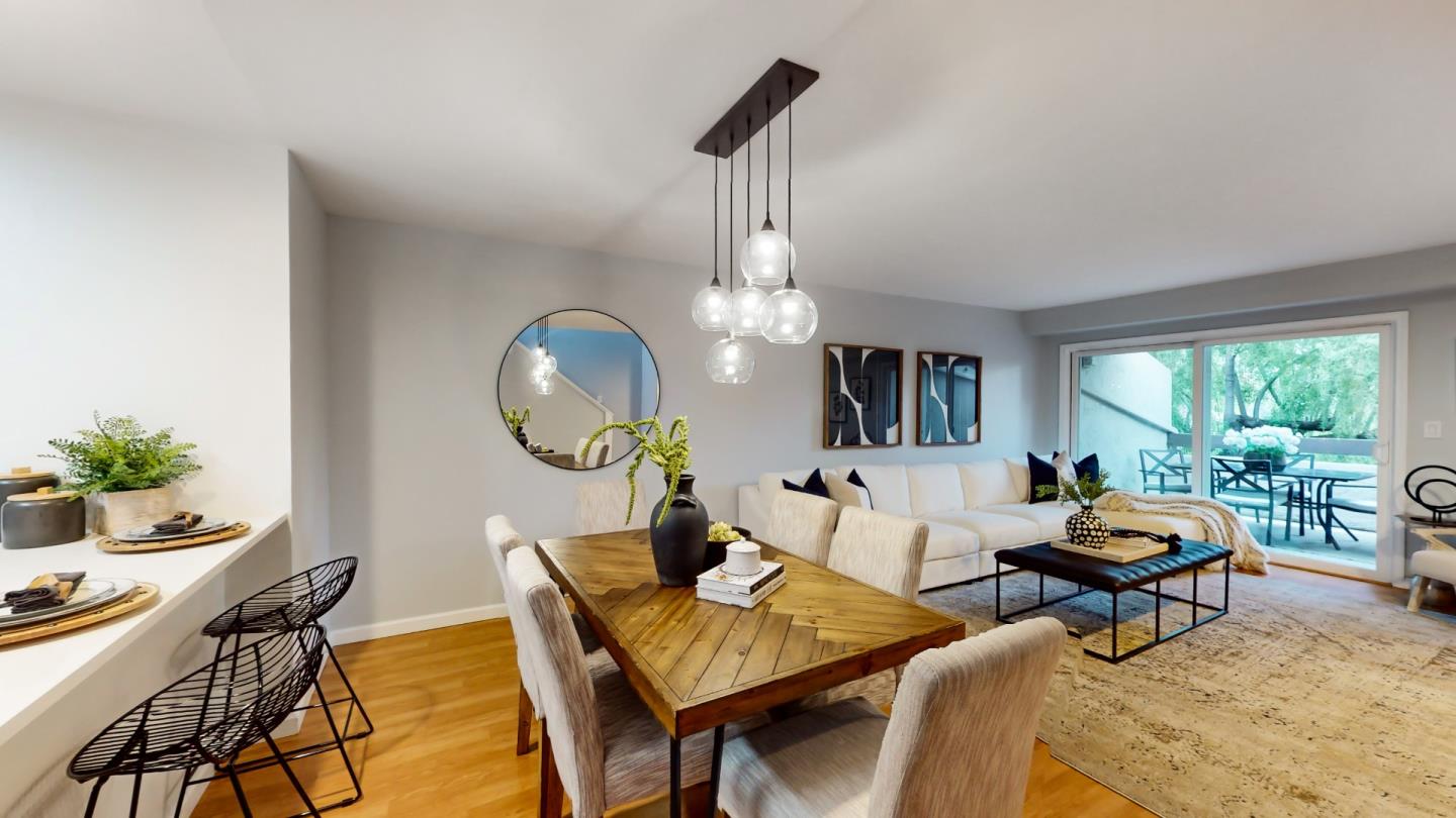 2201 The Alameda, Unit 27 Santa Clara, CA 95050 - Photo 6 of 25 a living room with furniture a window and a dining table