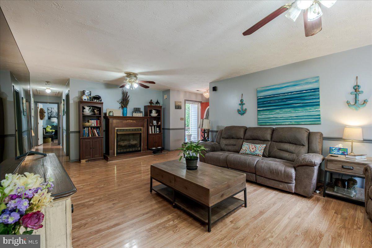 11419 Oak Grove Road Bristol, VA 24202 - Photo 10 of 36 a living room with furniture and wooden floor