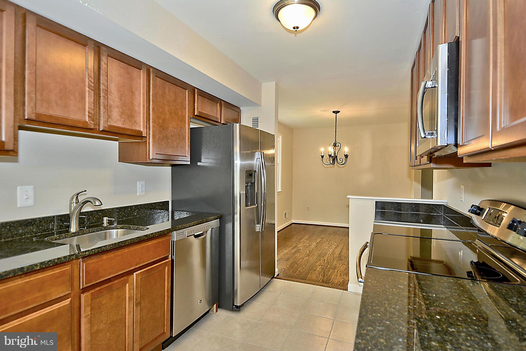 16201 Kent Road Laurel, MD 20707 - Photo 2 of 30 Smooth cooktop and Side by Side Fridge