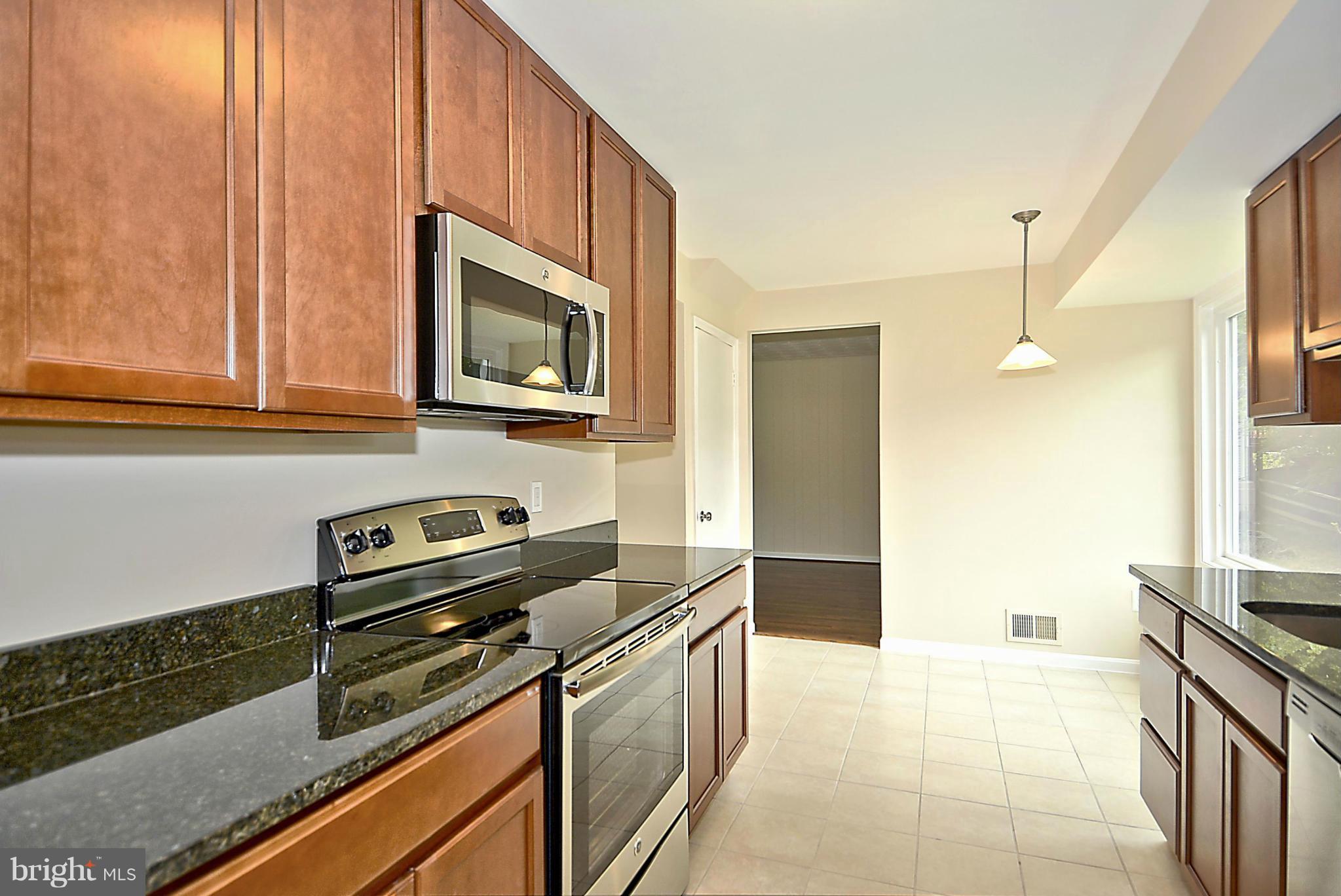 16201 Kent Road Laurel, MD 20707 - Photo 3 of 30 All new Kitchen, Maple Cabinets, Granite