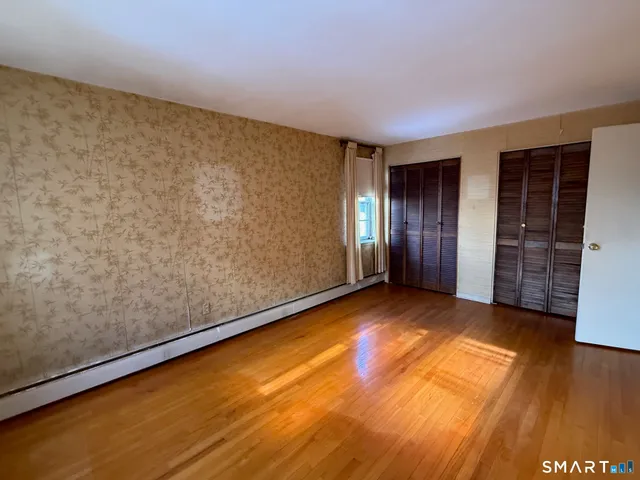 an empty room with closet