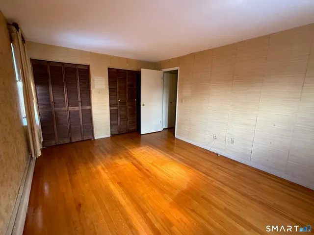an empty room with closet