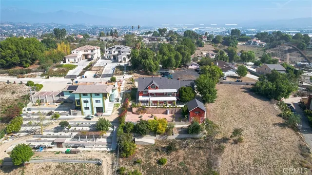 an aerial view of a city with lots of residential buildings
