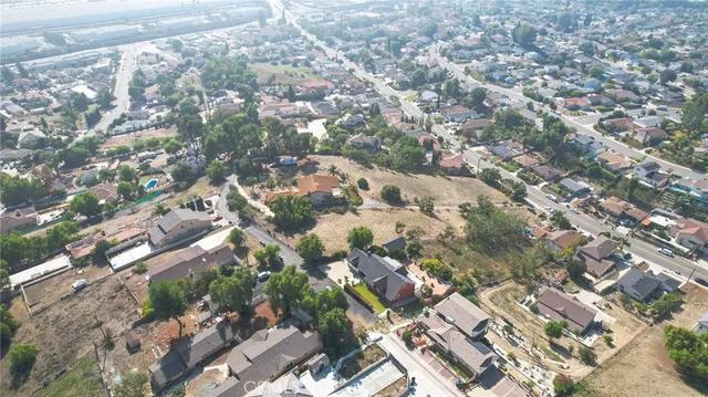 a bedroom with a bed and a ceiling fan in it