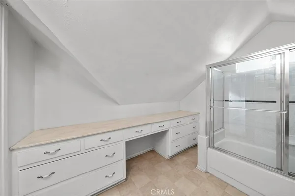 a kitchen with stainless steel appliances granite countertop a stove a refrigerator and a sink