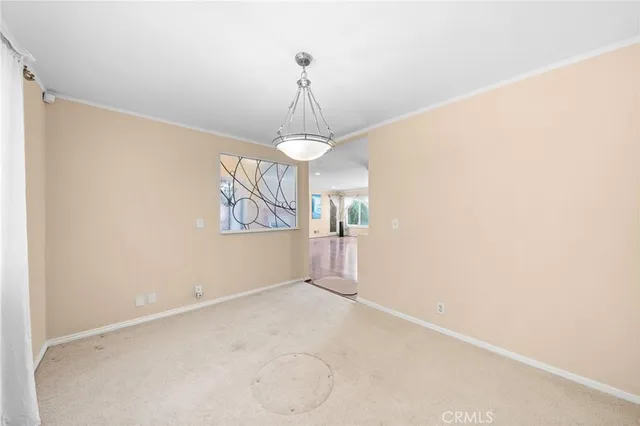 a view of empty room with windows