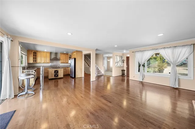 a bathroom with a granite countertop tub a sink and a shower