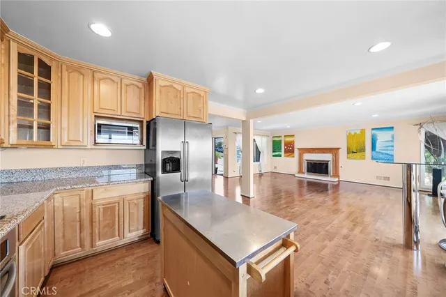 a view of a livingroom with furniture and a window