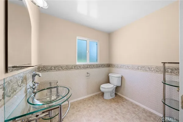 an empty room with wooden floor