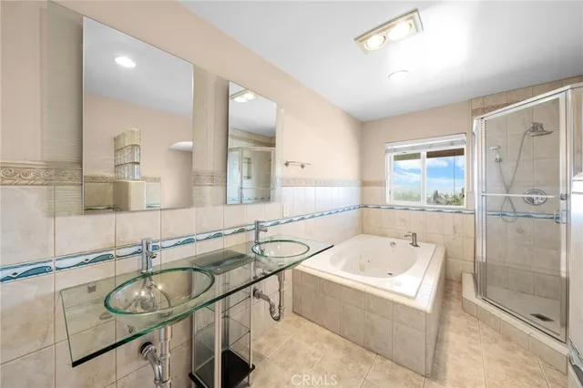 a view of a yard with an ocean and trees in the background