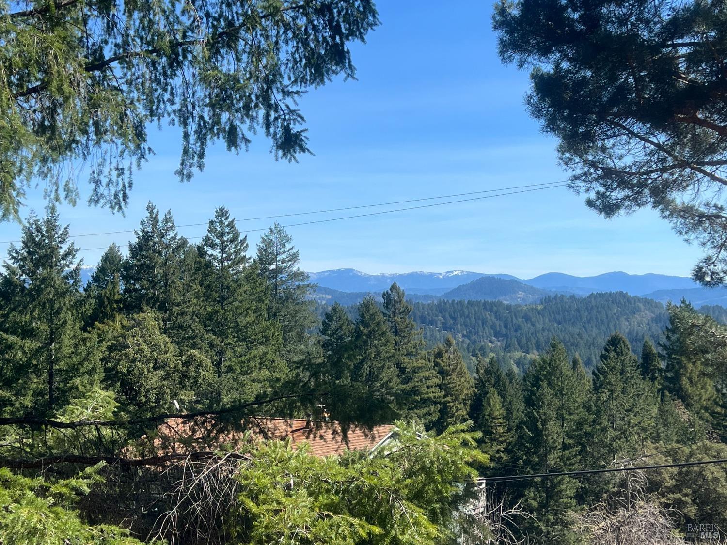 a view of a lake with a mountain in the background