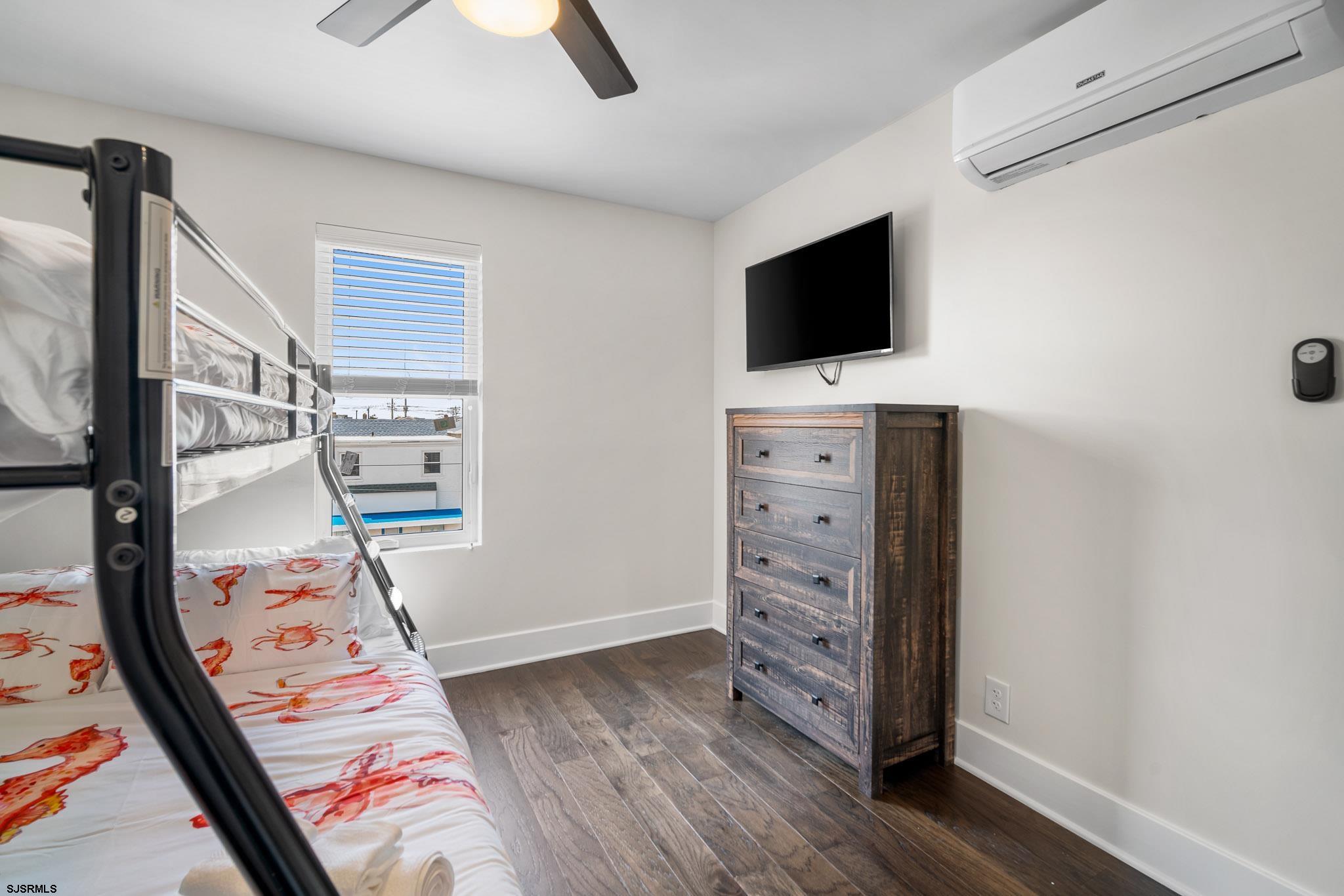 1059 Asbury Avenue, Unit 2 Ocean City, NJ 08226 - Photo 12 of 14 a view of a livingroom with furniture