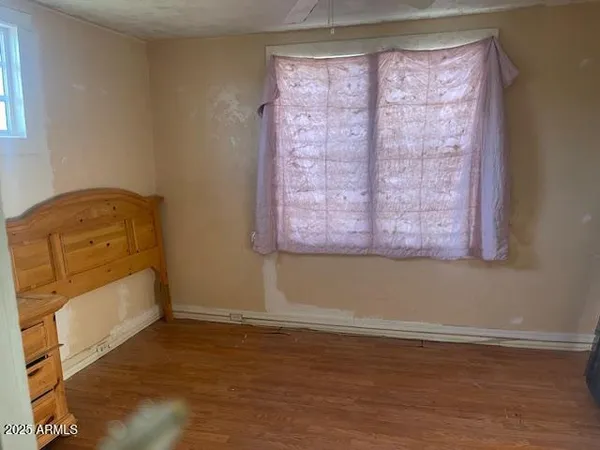 a view of a room that has a window in it