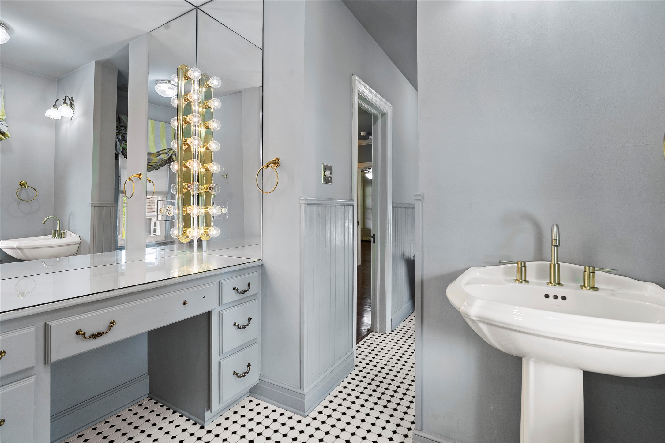 9827 FM 2759 Road Richmond, TX 77469 - Photo 29 of 50 a bathroom with a sink and a mirror