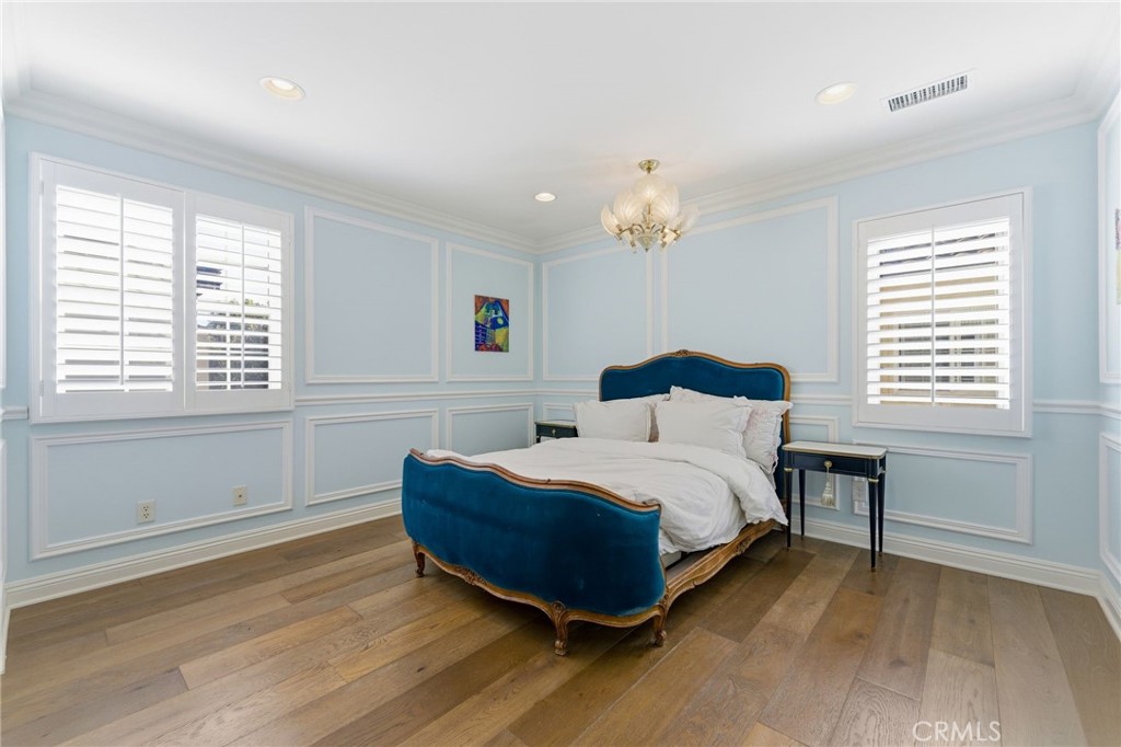 27 Gardenpath Irvine, CA 92603 - Photo 23 of 34 a spacious bedroom with a bed and a window