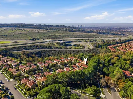 a view of a city with lots of trees
