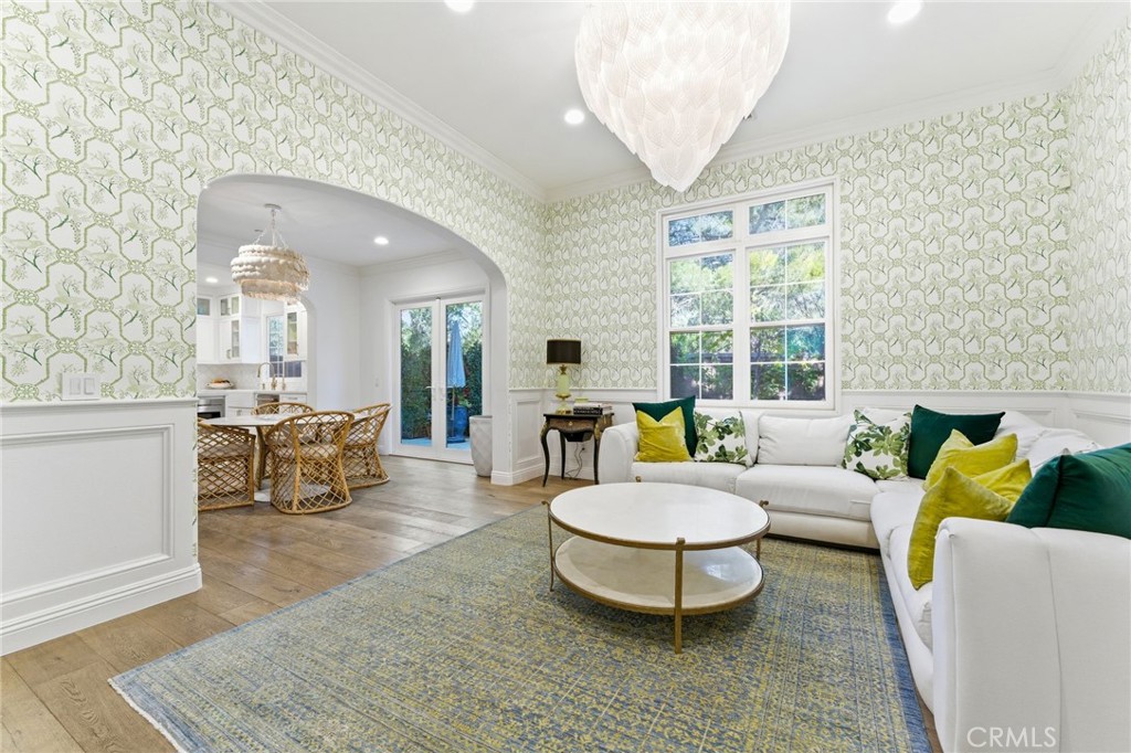 27 Gardenpath Irvine, CA 92603 - Photo 10 of 34 a living room with furniture and wooden floor
