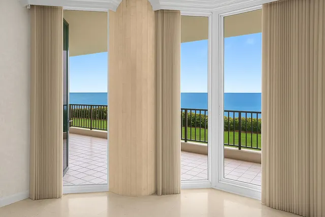 a balcony with view of city from a balcony