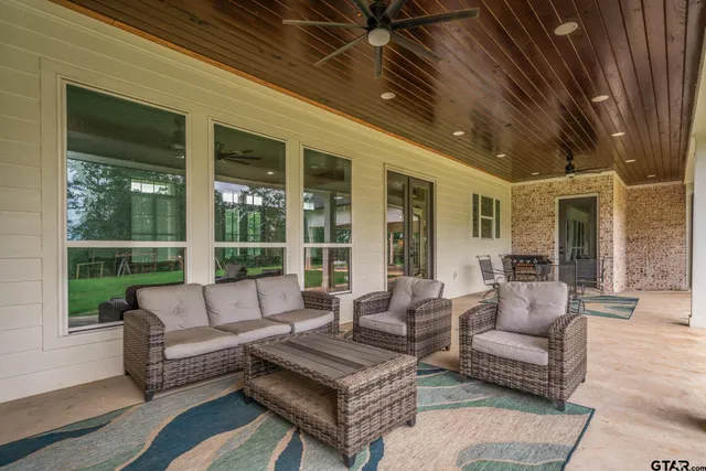 a view of a patio with backyard
