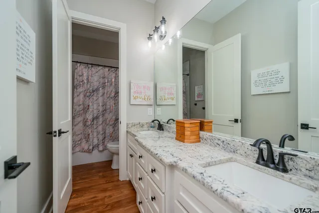 an open kitchen with a table and chairs