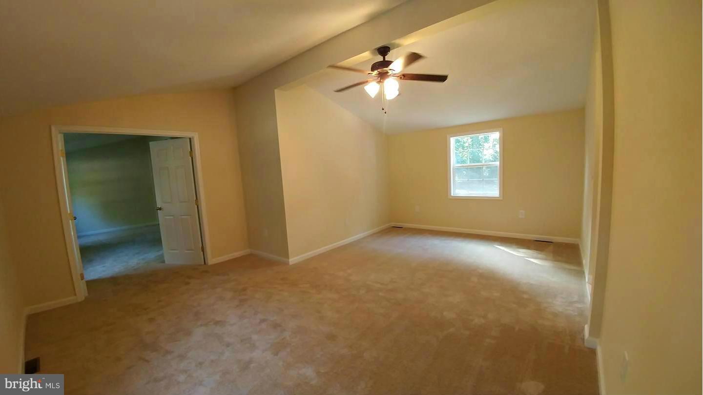 7435 Simms Landing Road Port Tobacco, MD 20677 - Photo 13 of 26 a view of an empty room with a window