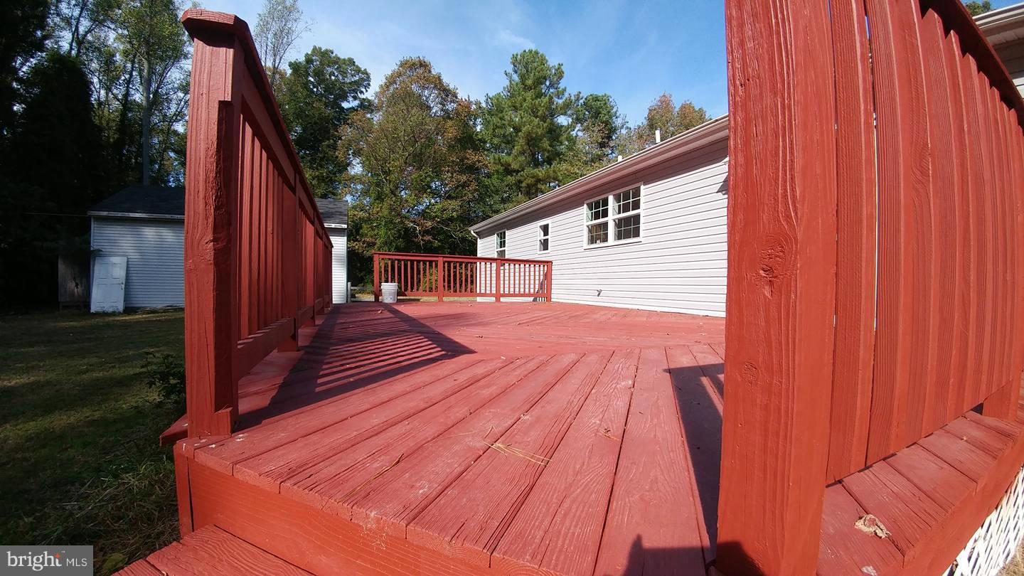 7435 Simms Landing Road Port Tobacco, MD 20677 - Photo 21 of 26 a balcony view with two chairs