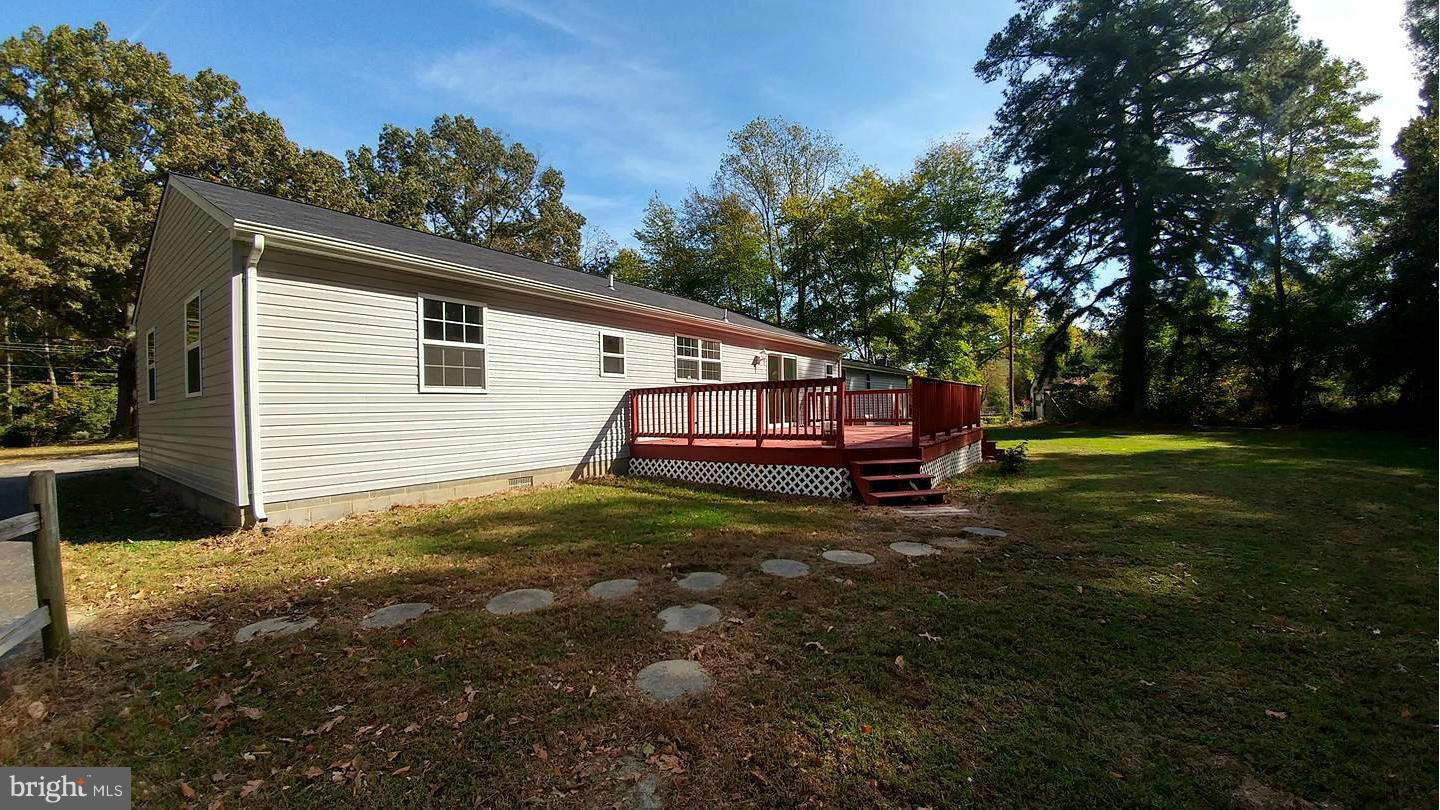 7435 Simms Landing Road Port Tobacco, MD 20677 - Photo 24 of 26 a view of a house with a yard