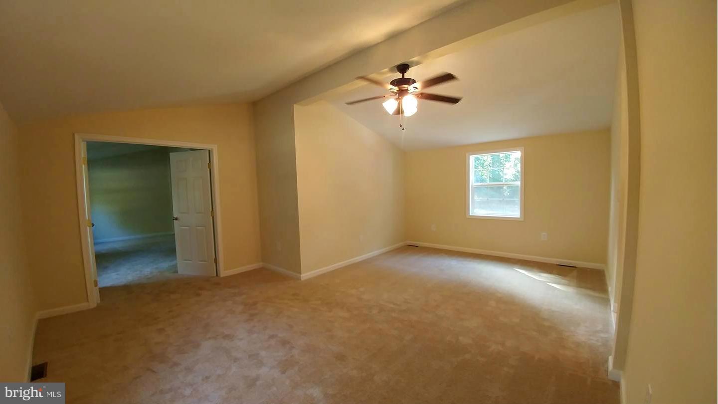 7435 Simms Landing Road Port Tobacco, MD 20677 - Photo 8 of 26 a view of an empty room with a window