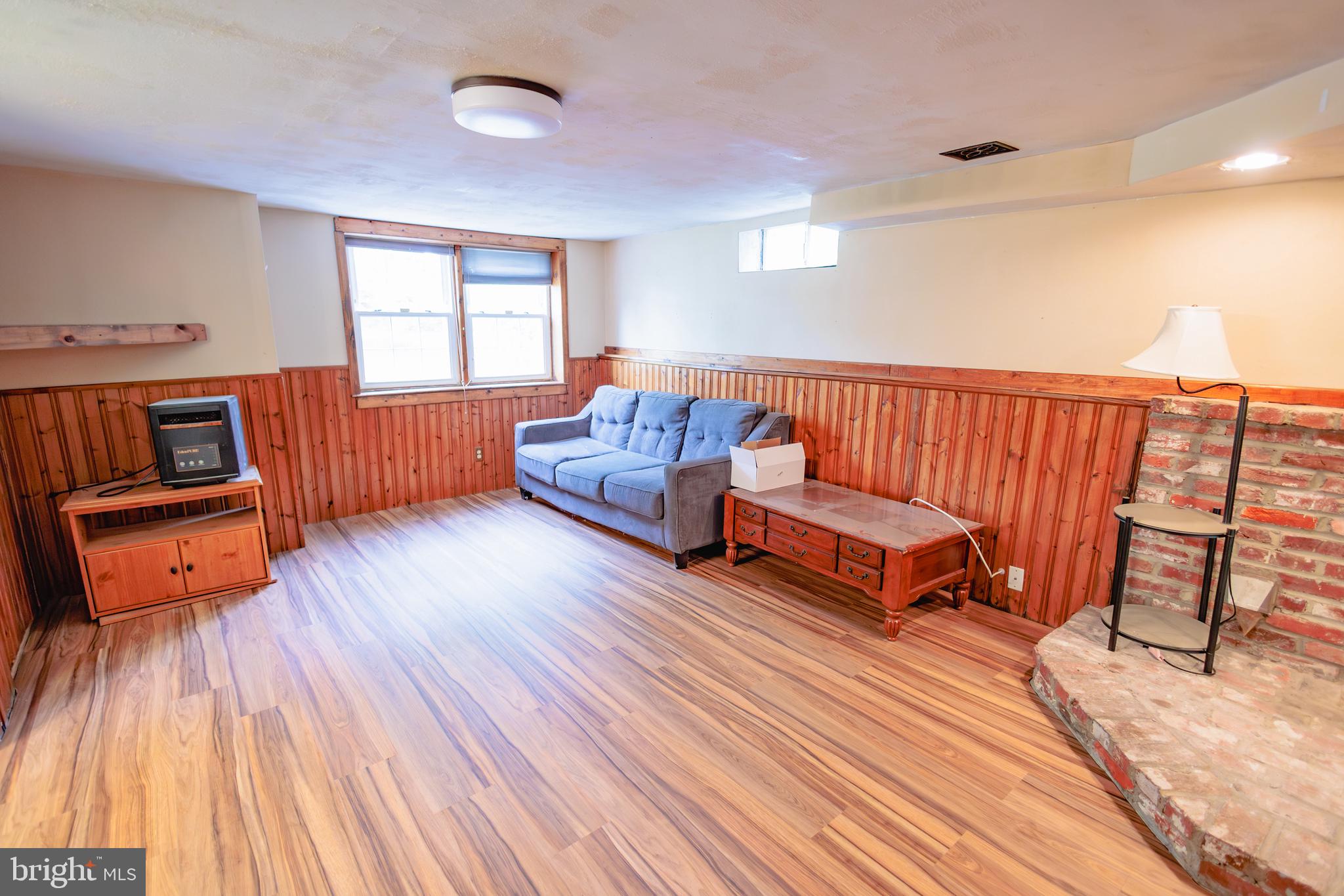 419 University Boulevard Glassboro, NJ 08028 - Photo 13 of 30 a living room with furniture and a wooden floor