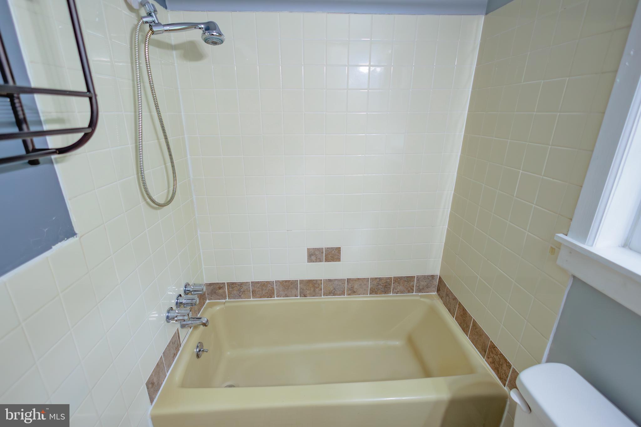 419 University Boulevard Glassboro, NJ 08028 - Photo 20 of 30 a bathroom with a bath tub and a shower