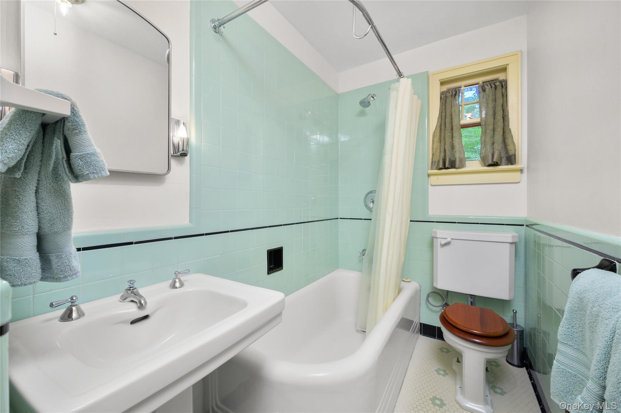 77 Lake Drive Cold Spring, NY 10516 - Photo 14 of 49 a bathroom with a sink and a mirror