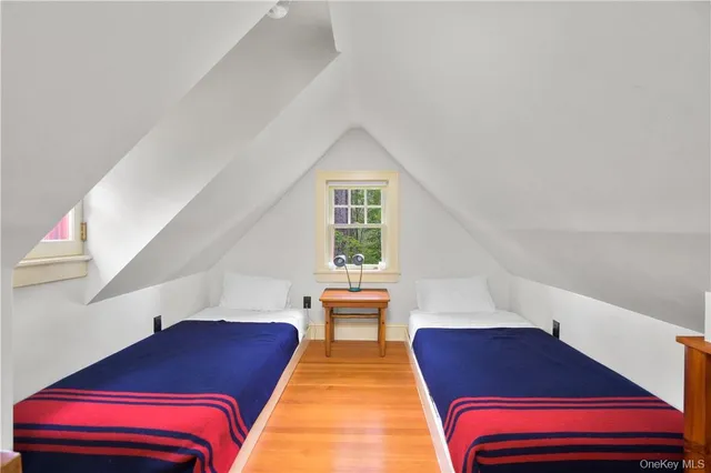 a room with a bed and a window