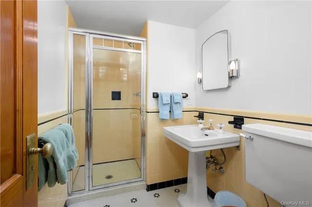 a bathroom with a sink and mirror