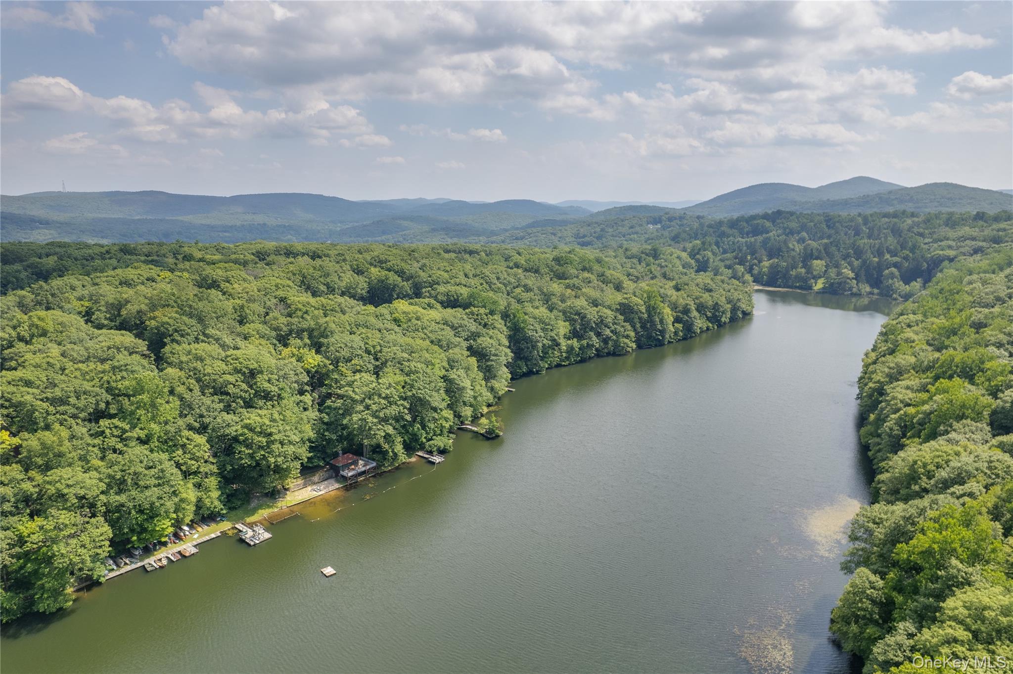 77 Lake Drive Cold Spring, NY 10516 - Photo 49 of 49 a view of a lake with a mountain in the background