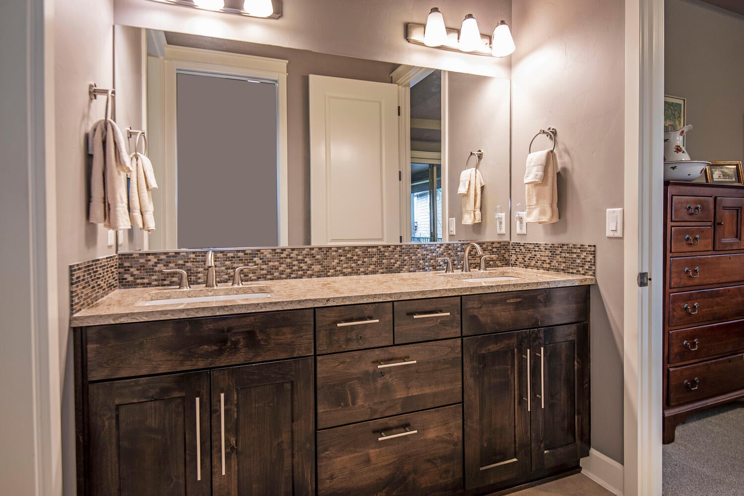 2630 Northwest Boulder Ridge Loop Bend, OR 97703 - Photo 18 of 31 Double sinks, quartz countertops, walk-in closet, shower, and commode room.