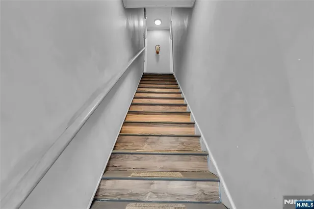 a view of a street with cars