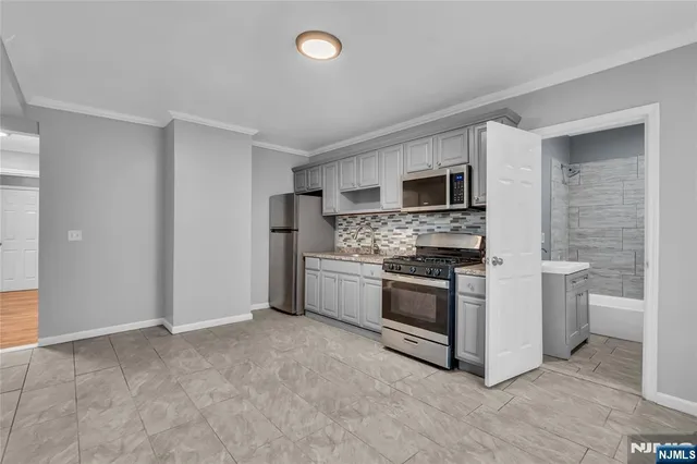 a view of kitchen and utility room
