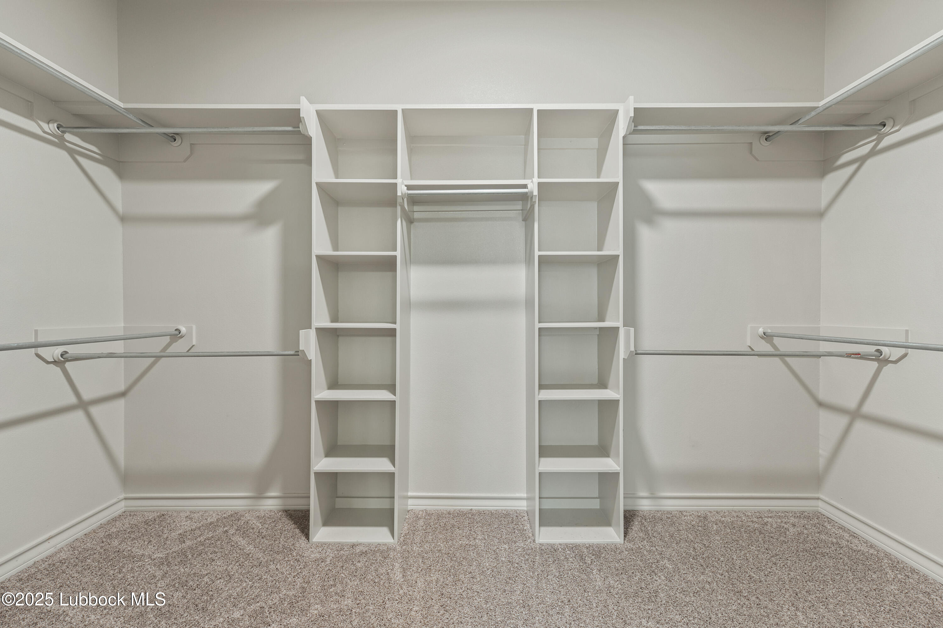 5303 Lehigh Street Lubbock, TX 79416 - Photo 19 of 31 a view of an empty walk in closet