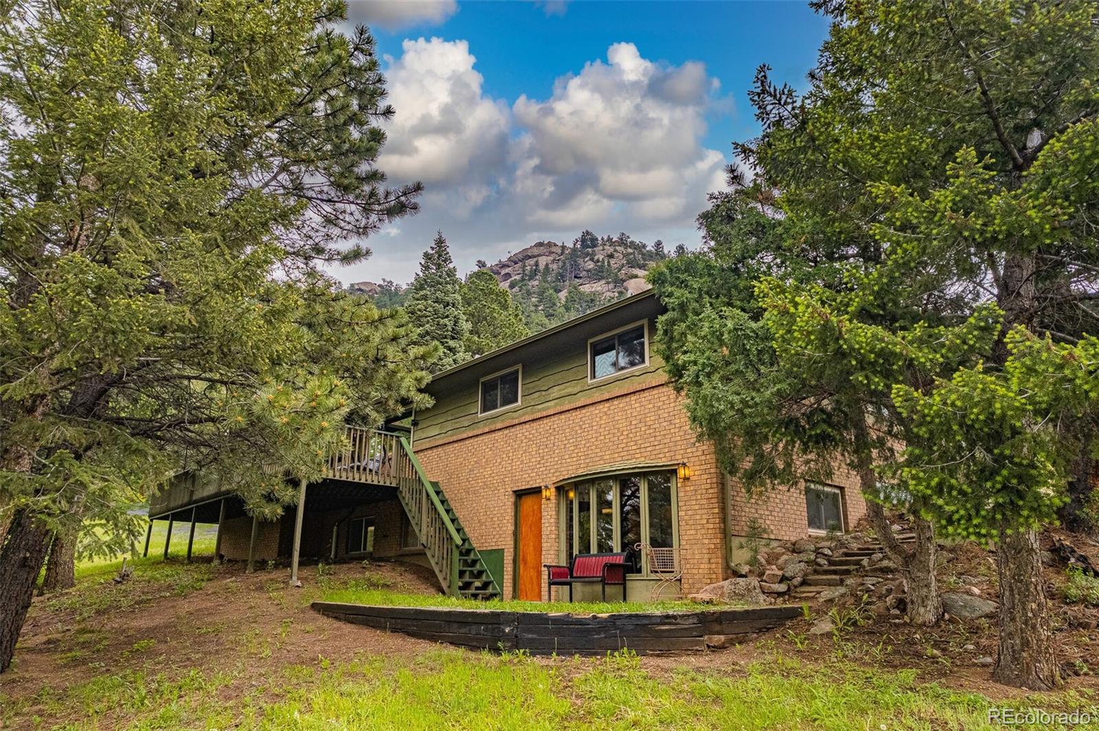 a view of house with swimming pool