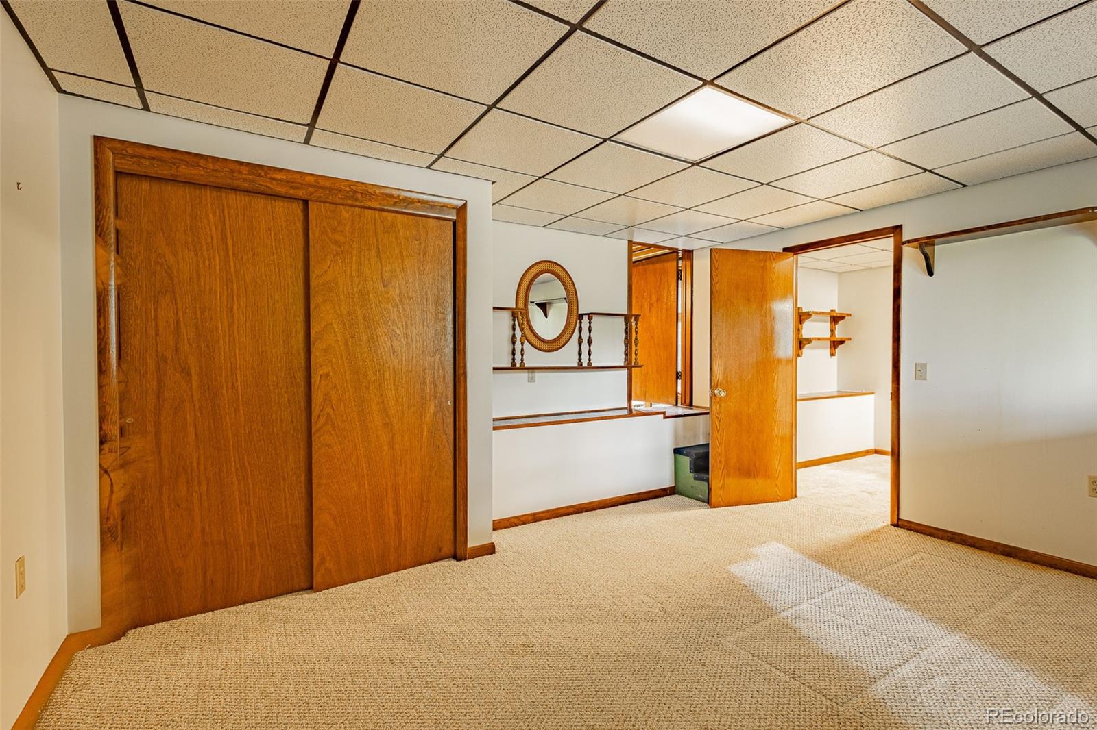 98 Button Rock Road Lyons, CO 80540 - Photo 22 of 40 a bedroom with a bed and a table