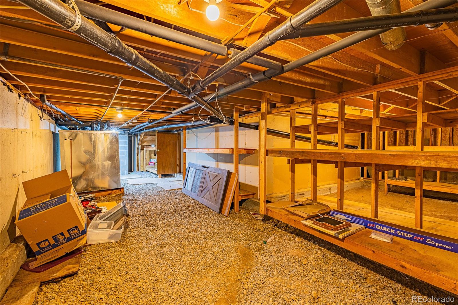 98 Button Rock Road Lyons, CO 80540 - Photo 33 of 40 a view of an empty room with windows