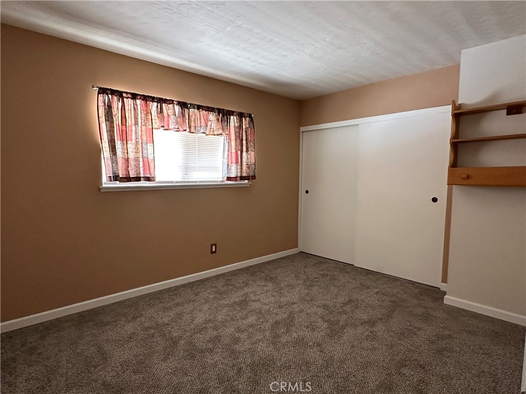 1624 Forane Street Barstow, CA 92311 - Photo 15 of 30 an empty room with windows and closet