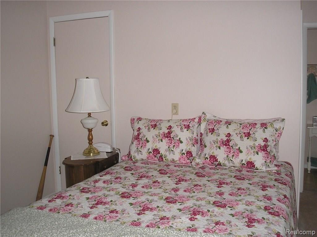 Master bedroom with access to half bath.