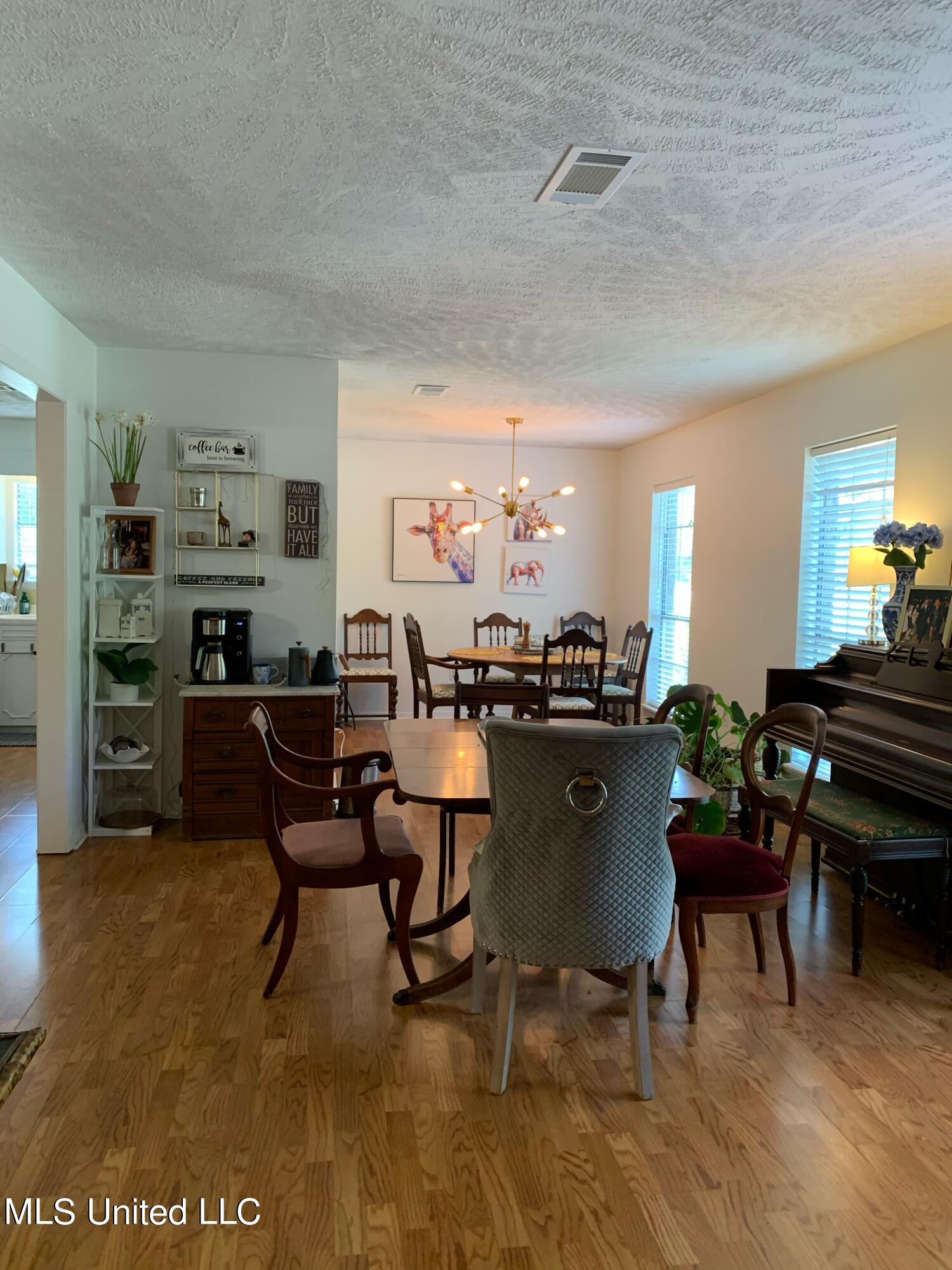 119 St Augustine Drive Madison, MS 39110 - Photo 10 of 23 Formal Dining and Breakfast Rooms