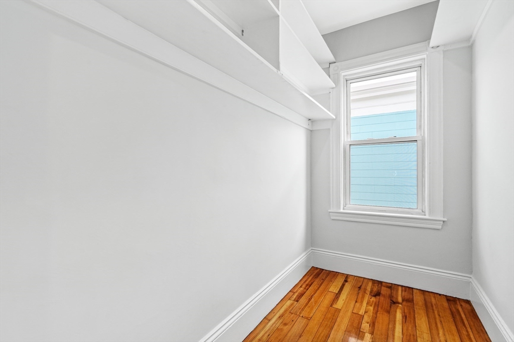 79 Pleasant Street Boston, MA 02125 - Photo 18 of 34 a view of a room that has a window in it