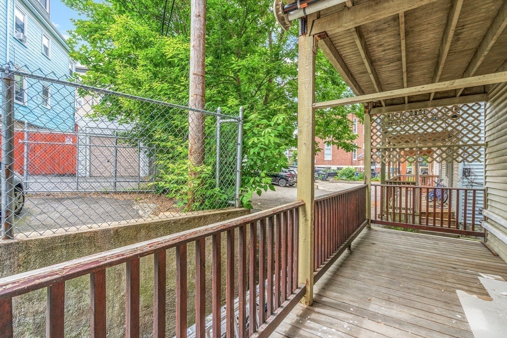 79 Pleasant Street Boston, MA 02125 - Photo 21 of 34 a view of a wooden fence