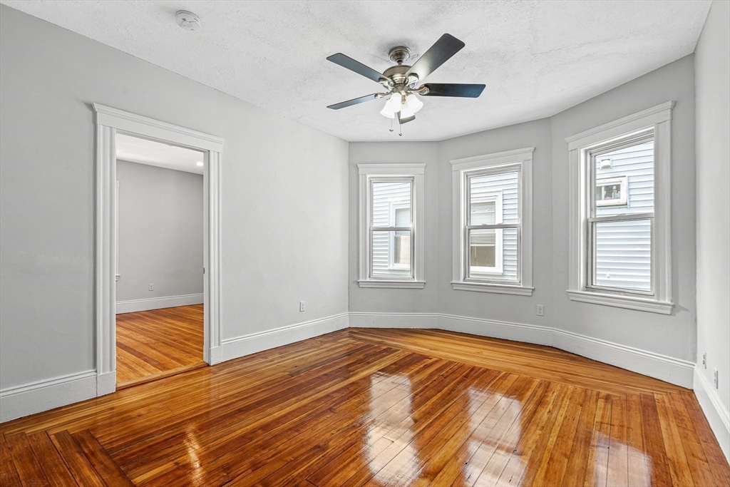 79 Pleasant Street Boston, MA 02125 - Photo 34 of 34 a view of a livingroom with a workspace