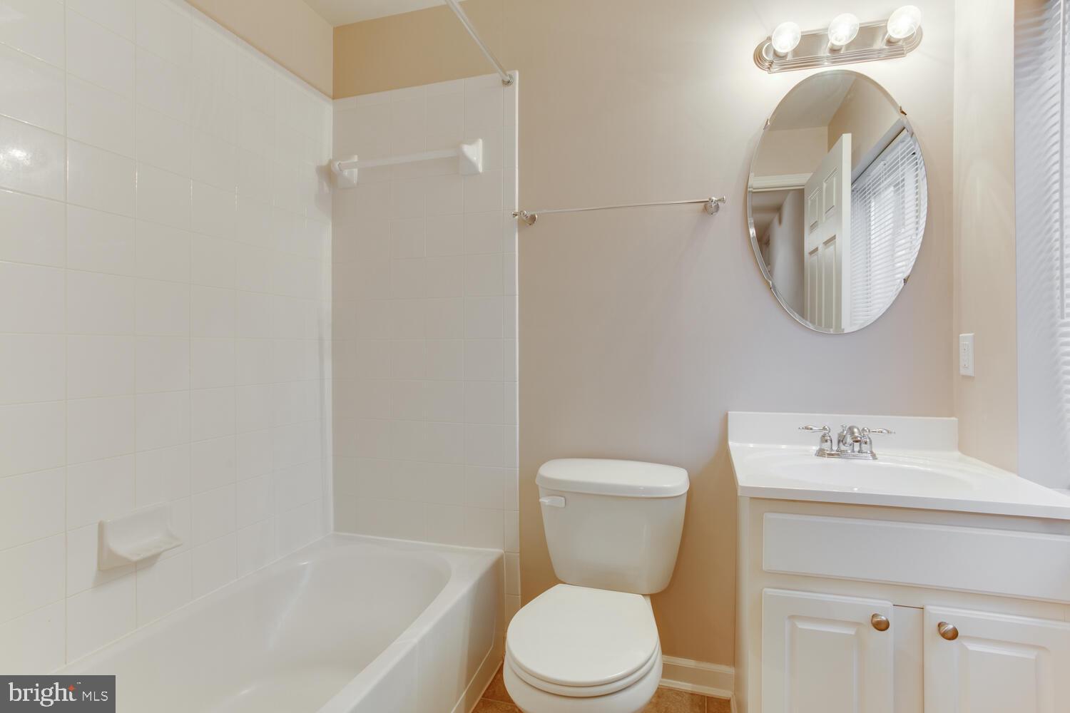2303 Forest Ridge Terrace, Unit E Chesapeake Beach, MD 20732 - Photo 11 of 73 Main level bathroom